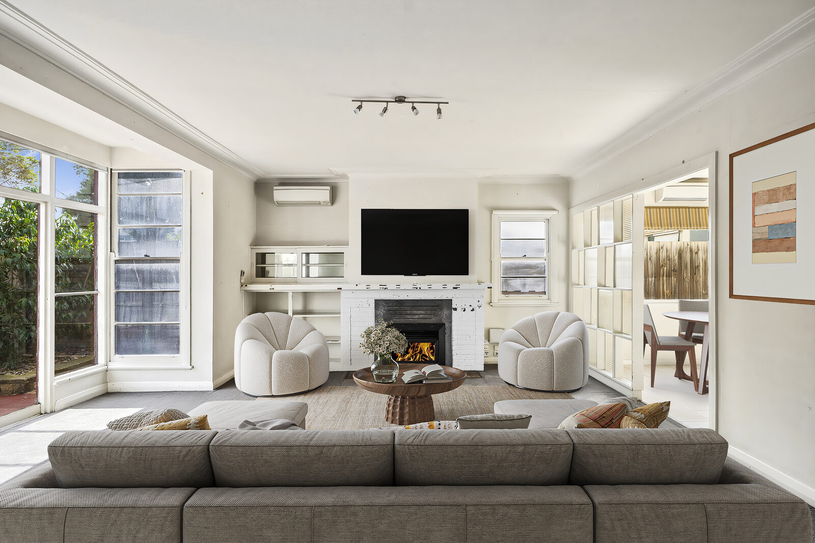 Same living room furnished after virtual staging